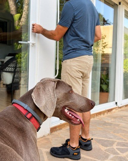 Carlos with dog outside property in Mallorca